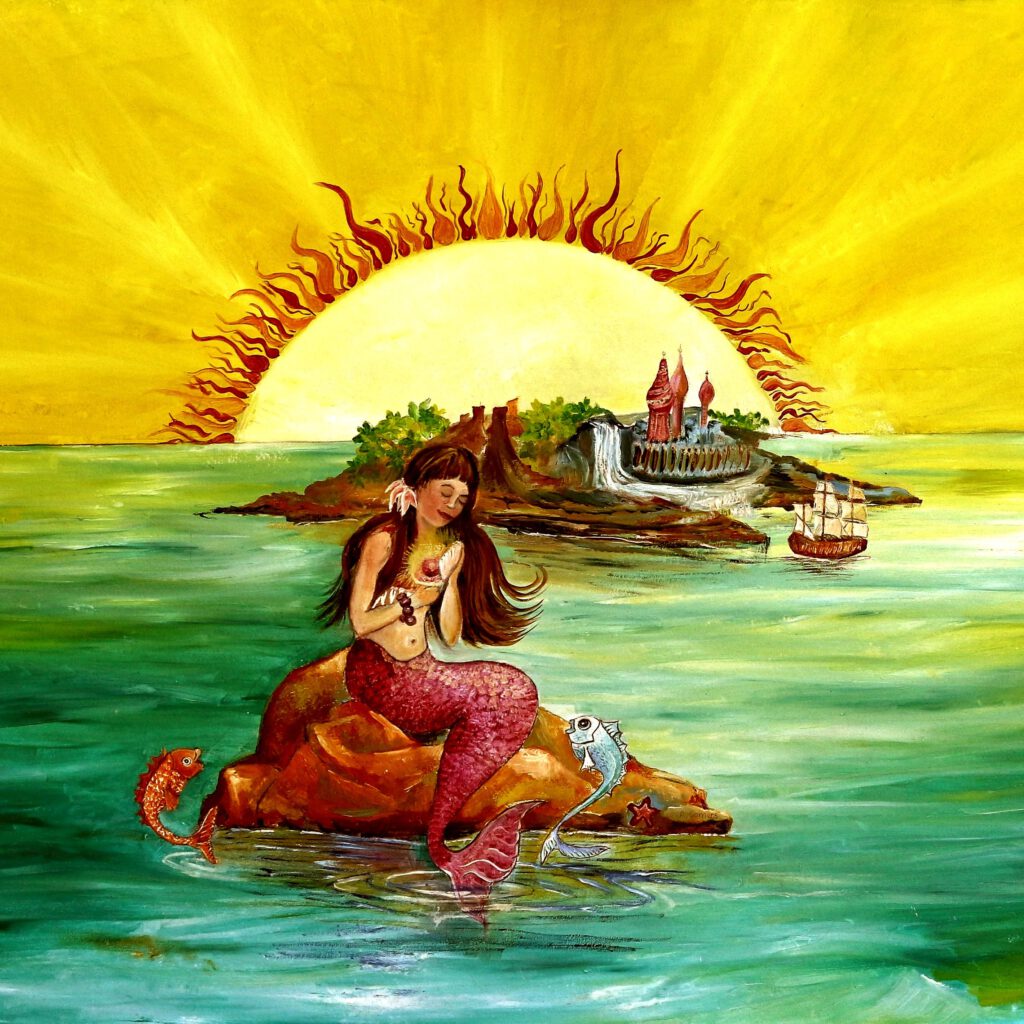 Wanddecoratie voor meisjeskamer. Een zeemeermin zit op een rots te spelen met visjes.